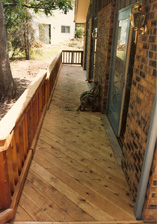 Cedar walkway connecting the Main Deck and Three Sliding Doors