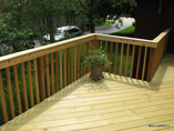Second Story Deck Extension with Rail to Match Existing Deck