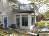 TimberTech Deck in Gray Built over Existing Sunroom with 20' Clear Span