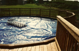 Pool Deck with Custom Rail attached to Pool