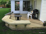 Small Low to Grade Deck with Floating Bench
