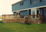 Pressure Treated Pine Deck with Solid Vertical Skirting and Standard Rail with Finials